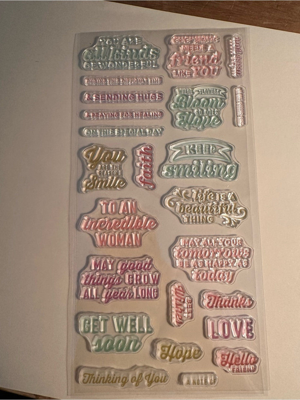 Sheet of 25 assorted sentiment clear stamps